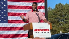 Herschel Walker, facing new abortion allegations, vows ‘they’re not stopping me. I’m winning this’