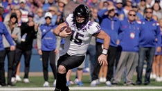 Kansas falls to No. 17 TCU, loses QB Jalon Daniels to injury