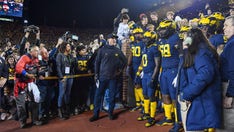 Second Michigan football player shown getting roughed up, hit with helmet in video