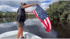 Florida deputies rescue American flag from flooded river after Hurricane Ian