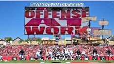 Buccaneers security tackles young intruder during game vs. Falcons