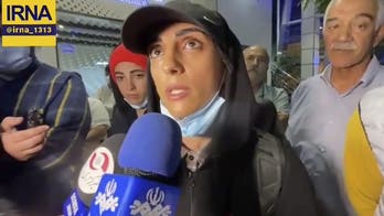 Iranian sport climber Elnaz Rekabi returns to Tehran after competing without wearing required hijab