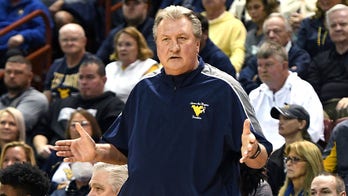 West Virginia basketball coach Bob Huggins directs homophobic slur at Xavier fans during live radio show