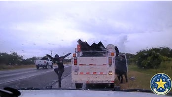Texas troopers apprehend 15 illegal immigrants seen on video fleeing work truck