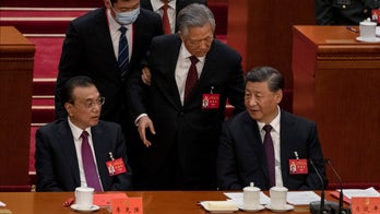 Drama at Chinese Communist Party summit: Xi predecessor Hu Jintao hauled out