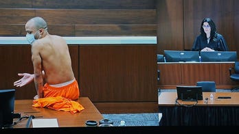 Accused Waukesha killer Darrell Brooks takes off shirt, closes eyes while victims' names read aloud