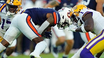 LSU's Sevyn Banks leaves game on stretcher after hard hit on opening kickoff