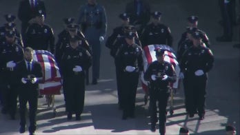 Connecticut police officers' funeral draws thousands to stadium for heartwrenching ceremony