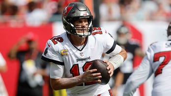 Bucs' Tom Brady faces criticism for attempting to kick Falcons defender during controversial play