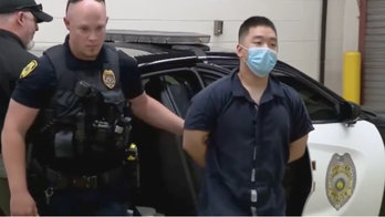 Purdue University dorm murder suspect utters 'I love my family' before entering jail