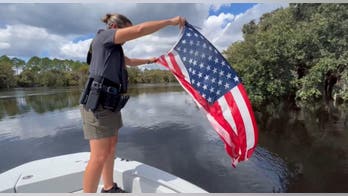 Florida deputies rescue American flag from flooded river after Hurricane Ian
