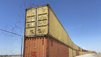 Biden admin accuses Arizona of trespassing by building barrier on US-Mexico border