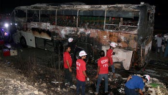 Pakistan bus fire kills 18 flood survivors