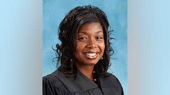 Ohio judge removed over 'unprecedented misconduct' including courtroom jokes about bribes, strip clubs