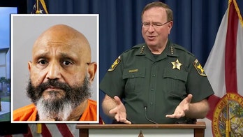 Father and son shoot at woman in parked car after reportedly believing her to be a burglar: police