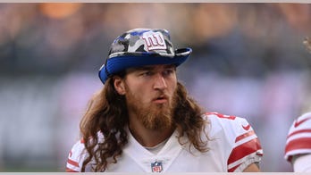 Giants player hasn't made trip back from London due to passport issues: report