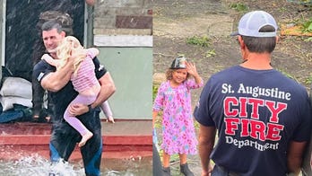 St. Augustine, Florida firefighter rescues little girl during Hurricane Ian flooding