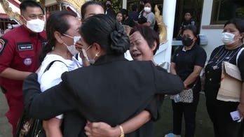 Parents collapse in grief after reuniting with children who were killed in Thailand day care massacre