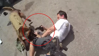 Bodycam footage shows Arizona authorities opening fire on suspect as he aims gun at K9's head