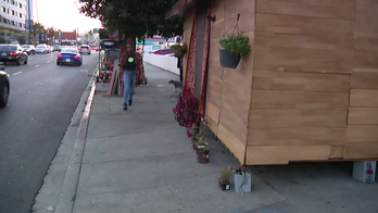 Homeless Los Angeles man builds wooden house on Hollywood Boulevard sidewalk: 'Gives me empowerment'
