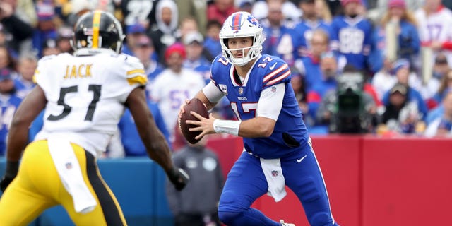 Josh Allen (17) of the Buffalo Bills runs against the Pittsburgh Steelers during the third quarter at Highmark Stadium Oct. 9, 2022, in Orchard Park, N.Y.
