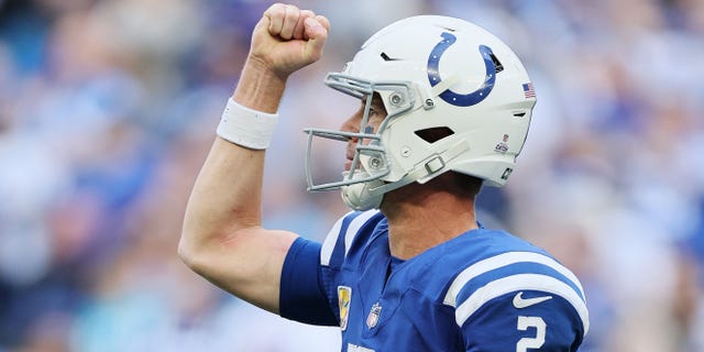 Matt Ryan #2 of the Indianapolis Colts celebrates after a two-point conversion against the Jacksonville Jaguars during the fourth quarter at Lucas Oil Stadium on October 16, 2022 in Indianapolis, Indiana.