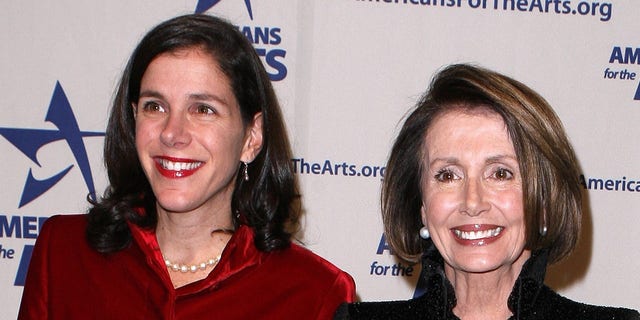 House Speaker Nancy Pelosi arrives with her daughter Alexandra for the Americans for the Arts National Arts Awards in New York, Oct. 5, 2009.