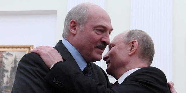 Russian President Vladimir Putin embraces his Belarusian counterpart, Alexander Lukashenko, during a meeting in Moscow, Russia Dec. 29, 2018. 