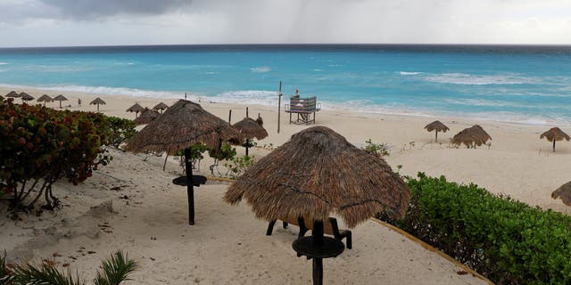 A general view shows a beach closed due to the proximity of Hurricane Zeta, in Cancun, Mexico Oct. 26, 2020. 