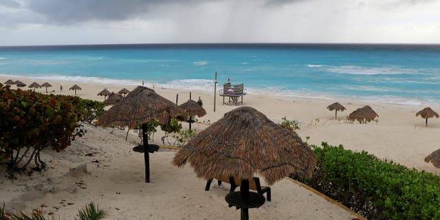 A general view shows a beach closed due to the proximity of Hurricane Zeta, in Cancun, Mexico Oct. 26, 2020.