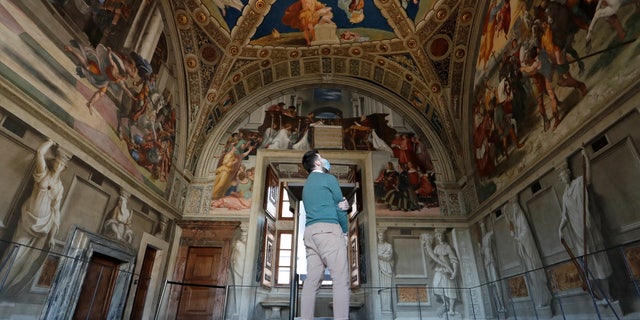 A man visits the Vatican Museums on the day of their reopening after weeks of closure, as coronavirus disease (COVID-19) restrictions ease, at the Vatican, May 3, 2021.