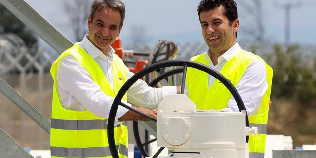 Greek Prime Minister Kyriakos Mitsotakis and his Bulgarian counterpart Kiril Petkov pose for a picture during the inauguration ceremony of the Interconnector Greece-Bulgaria (IGB) gas pipeline that will carry gas from Komotini to Stara Zagora in Bulgaria, in Komotini, Greece, July 8, 2022. 