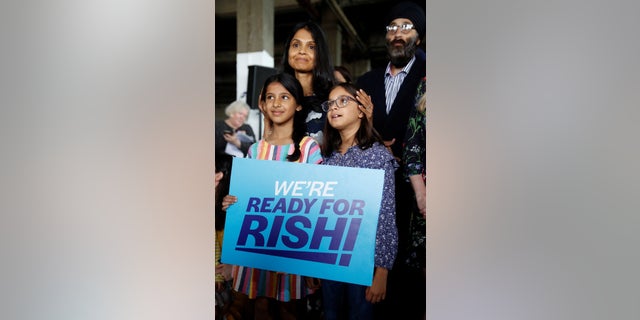Akshata Murthy and her daughters attend a Conservative Party leadership campaign event in Grantham, Britain on July 23, 2022.