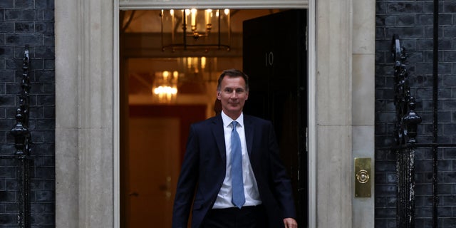 New Chancellor of the Exchequer Jeremy Hunt leaves 10 Downing Street in London Oct. 14, 2022. 