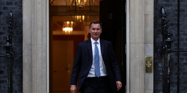 New Chancellor of the Exchequer Jeremy Hunt leaves 10 Downing Street in London Oct. 14, 2022.