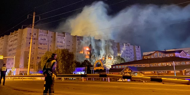 A view shows the site of a plane crash, after a Sukhoi Su-34 supersonic medium-range fighter-bomber plunged towards the residential building, in the southern city of Yeysk, Russia Oct. 17, 2022.