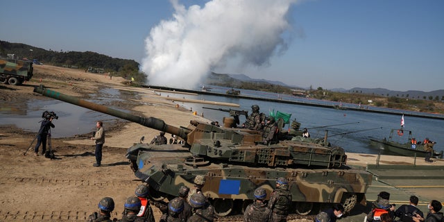 A South Korean armored vehicle takes part in a joint river crossing exercise between South Korean and US troops, in Yeoju, South Korea, October 19, 2022.
