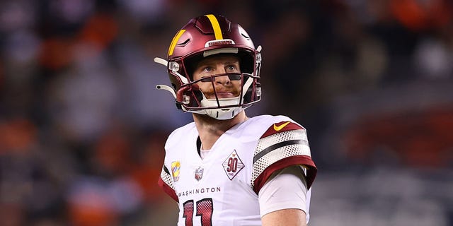 Carson Wentz of the Washington Commanders reacts during the Bears game at Soldier Field on October 13, 2022 in Chicago.