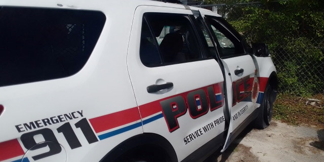 Turks and Caicos Islands police officers believe one suspect has died, but are still searching for more.
