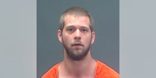 Jerry Toney, 25, was apprehended by officers as he was getting into a black Dodge pickup at a Walmart while sporting a hatchet and baton in his pants, which he reportedly said he needed for protection.