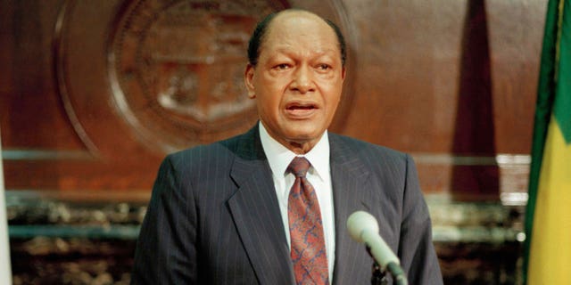 FILE - Los Angeles Mayor Tom Bradley speaks in a televised address following the verdicts in the trial of four Los Angeles police officers charged in the violation of Rodney King's civil rights, Saturday, April 17, 1993 in Los Angeles. (AP Photo/Akili-Casundria Ramsess, File).