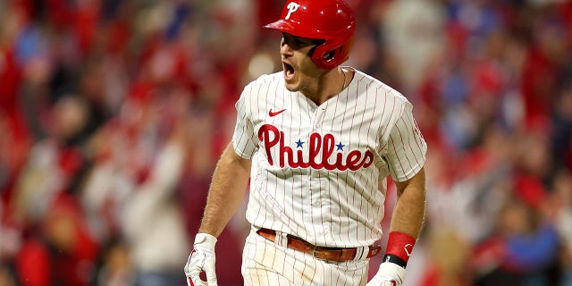 J.T. Realmuto #10 of the Philadelphia Phillies reacts after his solo home run during the seventh inning against the San Diego Padres in game four of the National League Championship Series at Citizens Bank Park on October 22, 2022 in Philadelphia, Pennsylvania.