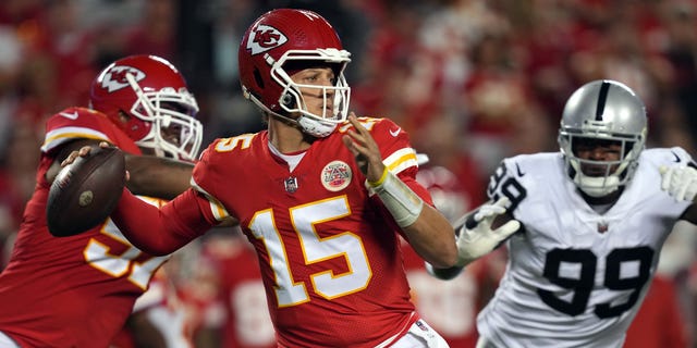 Patrick Mahomes #15 of the Kansas City Chiefs passes during the 1st half of the game a at Arrowhead Stadium on October 10, 2022 in Kansas City, Missouri.