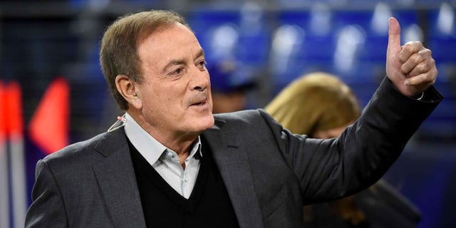 TV broadcaster Al Michaels looks on before a game