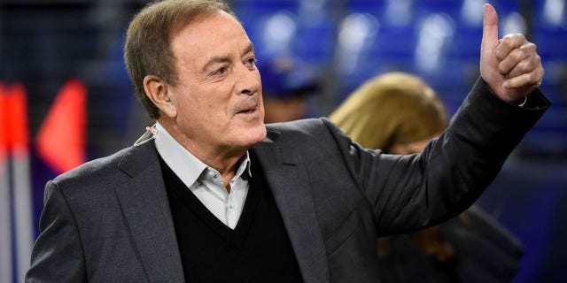 TV broadcaster Al Michaels looks on before a game