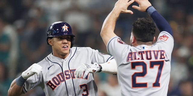 Jose Altuve after Jeremy Pena #3 of the Houston Astros hits a solo home run in the 18th inning against the Seattle Mariners during Game 3 of the American League Division Series at T-Mobile Park in Seattle on October 15, 2022. Reply to #27. Washington.