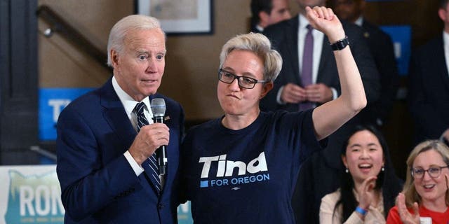 President Biden speaks alongside Tina Kotek, the Democratic nominee for governor, at SEIU Local 49 in Portland, Oregon, Oct. 14, 2022.