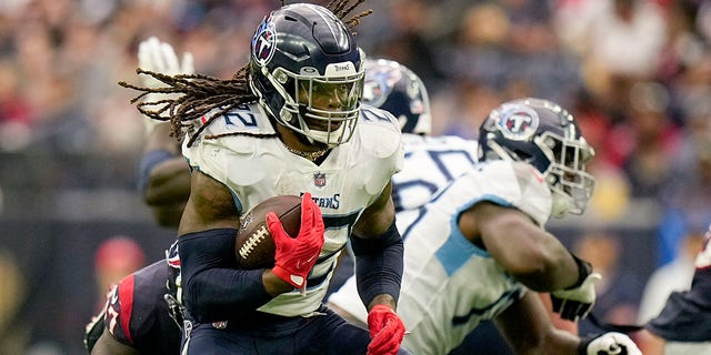 Tennessee Titans running back Derrick Henry runs 29 yards for a touchdown against the Houston Texans during the first half of a game on October 30, 2022 in Houston.