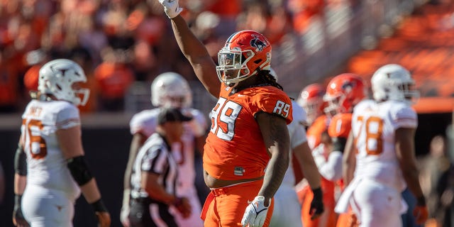 Oklahoma State Cowboys defensive end Tyler Lacy (89) reacts after a play during the first half against the Texas Longhorns on Oct 22, 2022, at Boone Pickens Stadium in Stillwater, Oklahoma.