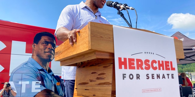 Republican Senate candidate Herschel Walker campaigns Sept. 7, 2021, in Emerson, Ga.